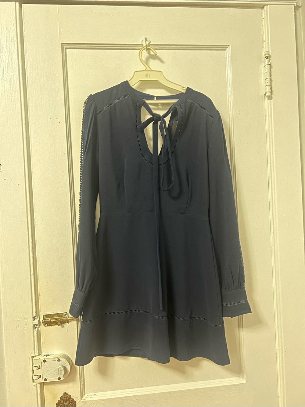Adelyn Rae Navy Long-Sleeve Tie-Neck Mini Dress